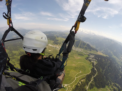 Sport 2000 Twoskigliss – Location ski Les Saisies- Bapteme parapente- Randonnee motoneige electrique